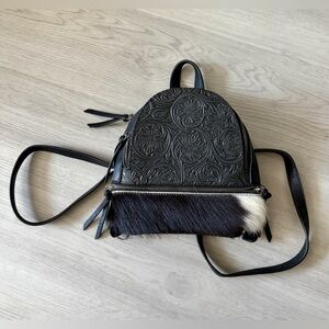 Trinity ranch Black & white leather cowhide backpack with a boho western vibe